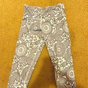 Lululemon size 4 capris. Grey and white with flowers/patterned